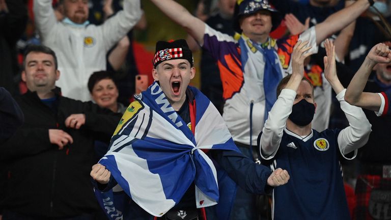 Scotland fans celebrate after the 0-0 draw with England