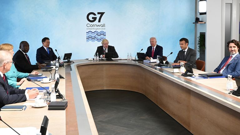 British Prime Minister Boris Johnson, U.S. President Joe Biden, France&#39;s President Emmanuel Macron, Canadian Prime Minister Justin Trudeau, Australia&#39;s Prime Minister Scott Morrison, German Chancellor Angela Merkel, South Africa&#39;s President Cyril Ramaphosa and South Korea&#39;s President Moon Jae-in attend a working session during G7 summit in Carbis Bay, Cornwall, Britain, June 12, 2021. Leon Neal/Pool via REUTERS
