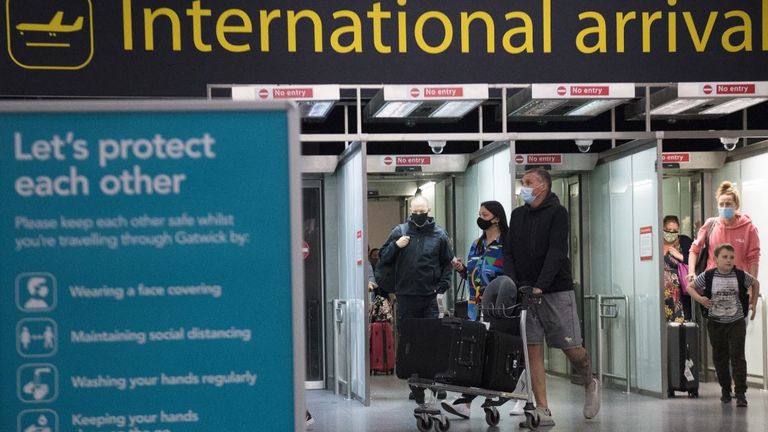 Passengers arrive at Gatwick Airport, West Sussex, before Tuesday&#39;s 4am requirement for travellers arriving from Portugal to quarantine for 10 days comes into force. Picture date: Monday June 7, 2021.