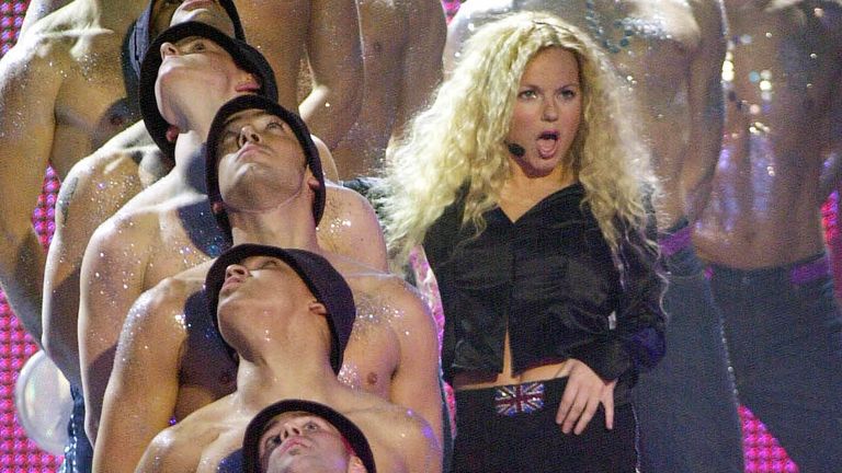 Geri Haliwell made a dramatic entry from between a pair of giant thighs for her performance during the Brit Awards 2000 - at which the Spice Girls also appeared

