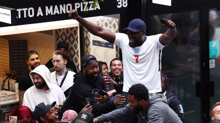 Stormzy, menonton dari Box Park di Stadion Wembley, merayakan kemenangan Inggris atas Jerman