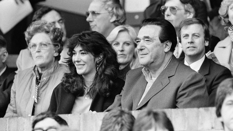 Robert Maxwell and his daughter Ghislaine watch the Oxford v Brighton football match in October 1984. Pic: Mirrorpix/Sky UK
