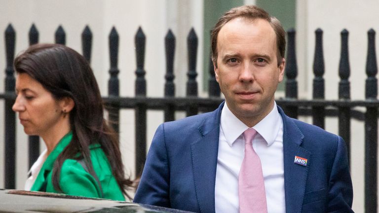Matt Hancock leaves 10 Downing Street with aide Gina Coladangelo in May
