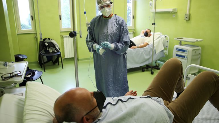 Patients, like this one in Italy, have the antibodies introduced into their bodies intravenously