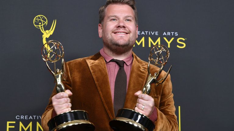 James Corden poses in the press room with the awards for outstanding short form variety series and outstanding variety special (pre- recorded) for "Carpool Karaoke: When Corden met McCartney Live From Liverpool" on night one of the Creative Arts Emmy Awards on Saturday, Sept. 14, 2019, at the Microsoft Theater in Los Angeles. (Photo by Richard Shotwell/Invision/AP)