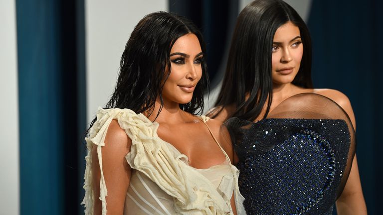 Kim Kardashian, left, and Kylie Jenner at the Vanity Fair Oscar Party in February 2020. Pic: AP
