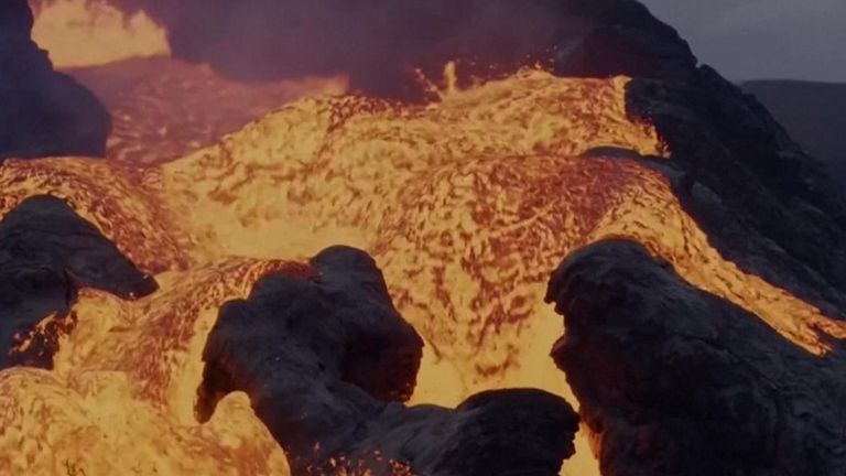 Watch lava cascade from Icelandic volcano
