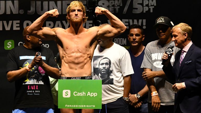 Logan Paul poses for photographers during a weigh-in Saturday, June 6, 2021, in Hollywood, Fla. Paul will fight Floyd Mayweather in an exhibition boxing match at Hard Rock Stadium in Miami Gardens, Fla. Sunday. (AP Photo/Jim Rassol)