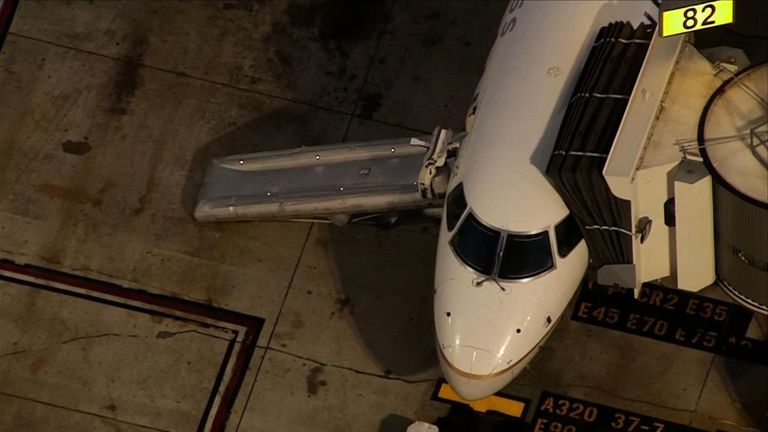 A man was injured when he escaped down a chute shortly after a plane left the gate at Los Angeles airport