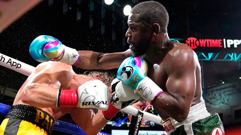 Floyd Mayweather, right, and Logan Paul fight during an exhibition boxing match at Hard Rock Stadium. Pic: AP