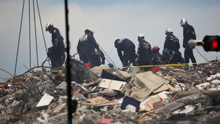 Search and rescue teams continue to try to find survivors in the rubble