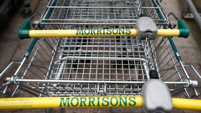 Shopping trolleys are parked at a Morrisons supermarket in south London