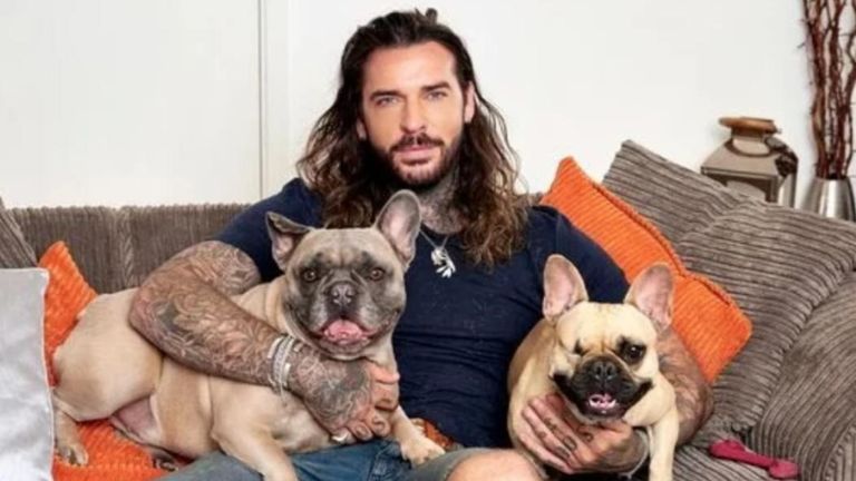 Animal rights campaigner and The Only Way Is Essex star Pete Wicks (pictured with his rescue dogs Peggy and Eric) is supporting the ear-cropped dogs petition