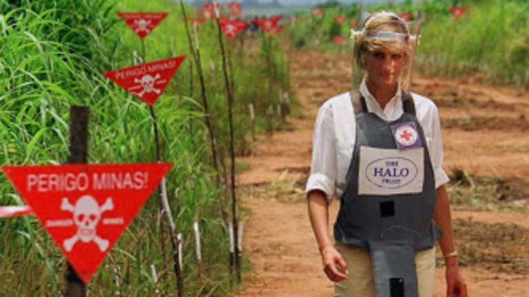 Princess Diana is pictured with a Halo Trust protective vest in a minefield in Angola in 1997