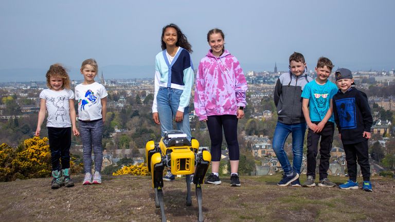 School pupils with the robot dog that is helping scientists with research in Scotland