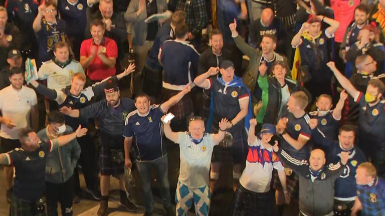 Scotland fans celebrate draw.