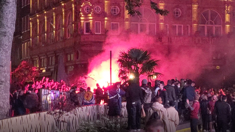 Supporters set off flares in Leicester Square after the match at Wembley. Credit: Rene Wolter