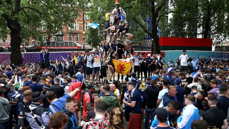 Scotland fans gather in Leicester Square before the UEFA Euro 2020 match between England and Scotland later tonight. Picture date: Friday June 18, 2021.