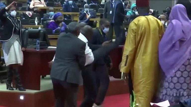 African Unionawmakers scuffle during a parliament meeting in Johannesburg.