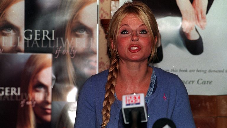 Geri Halliwell signing copies of her autobiography in October 1999, after leaving the Spice Girls the previous year