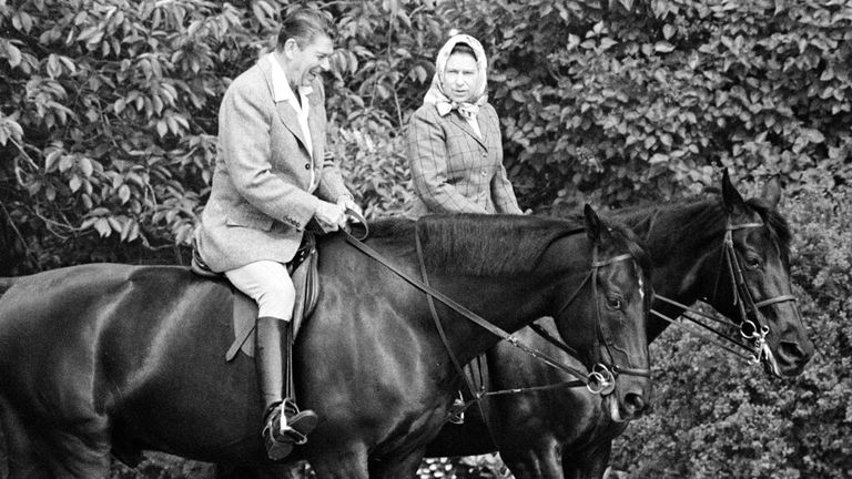 The Queen and Ronald Reagan on horseback in the grounds at Windsor in June 1982. Pic: AP