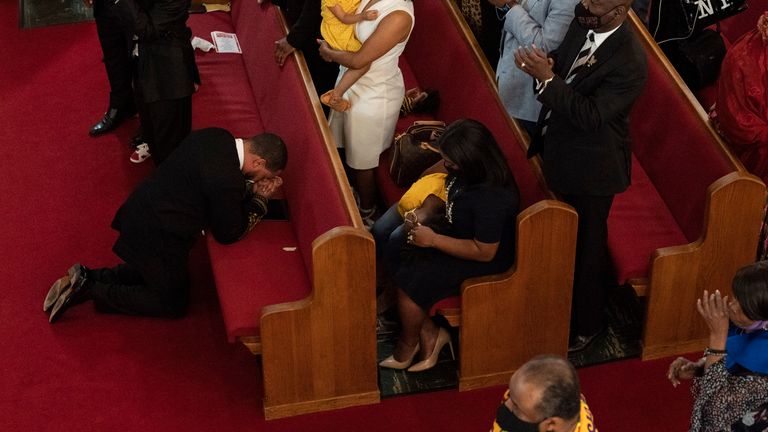 Reverend John Faison Senior kneels in prayer after preaching at a joint service for the centennial of the Tulsa Race Massacre at First Baptist Church of North Tulsa on Sunday. Pic AP

