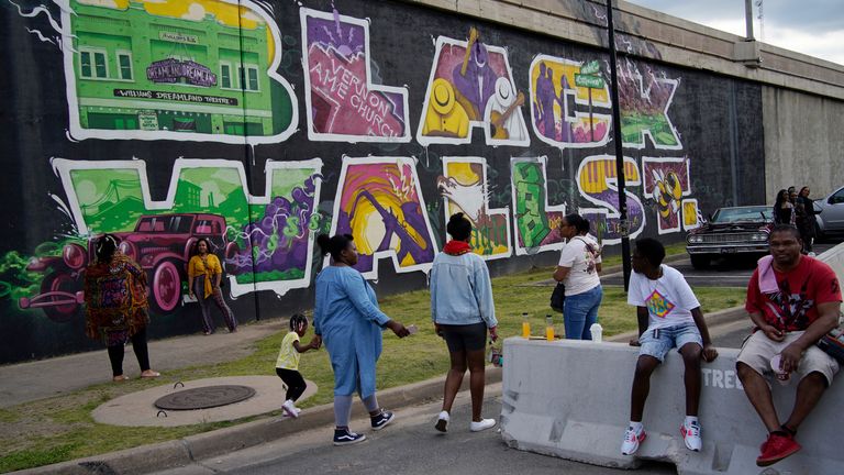 A memorial wall for Black Wall Street in the Greenwood district, where the 1921 massacre took place. Pic AP