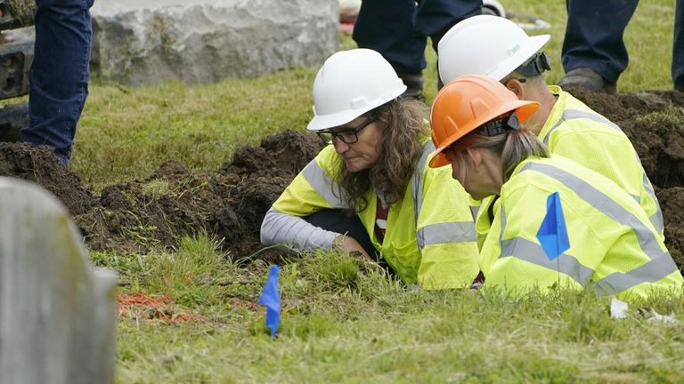 State archaeologist Kary Stackelbeck (left) has estimated that at least 30 bodies could be at the site. Pic AP