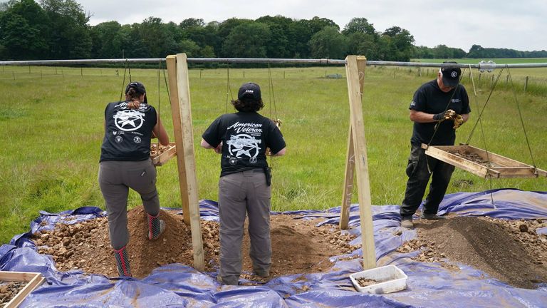 Archaeologists and American Defense POW/MIA Accounting Agency staff work to recover the remains of an American bomber crew, whose aircraft crashed at a site in Arundel in 1944 so they can be returned to the US. Picture date: Monday June 28, 2021.
