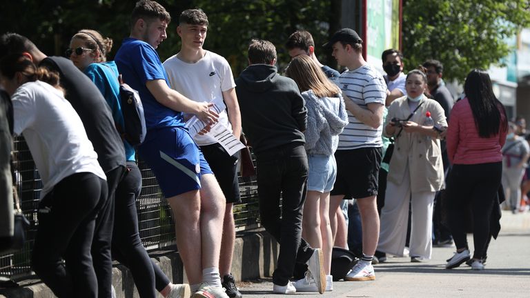 Young people queuing in Harrow to get vaccinated on Saturday