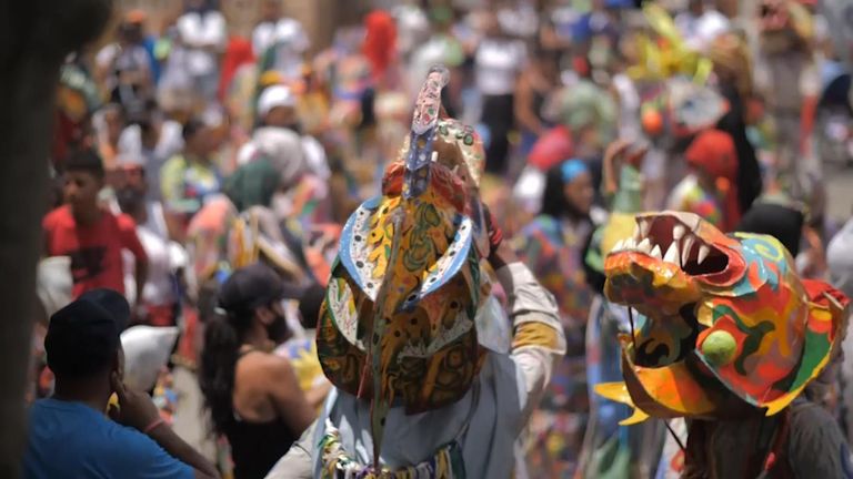 Catholic devotees in the Venezuelan town of Naiguata on Thursday participated in the &#34;Dancing Devils&#34; tradition, despite COVID-19 restrictions and an economic crisis.