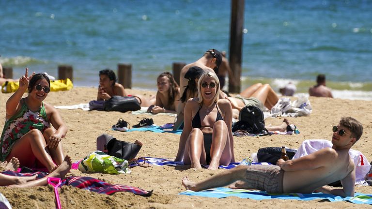 People enjoy the weather on Bournemouth beach in Dorset. Picture date: Saturday June 5, 2021.