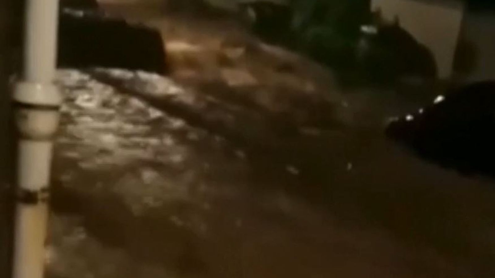 German street turns to river after torrential rain | World News | Sky News