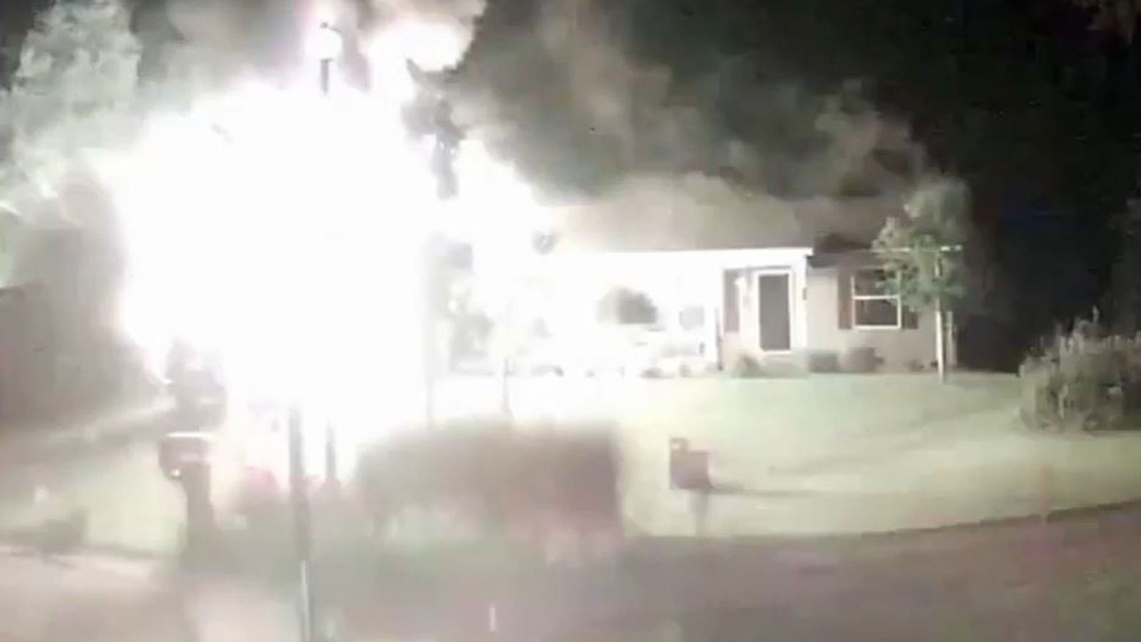 Firefighter escapes as empty house explodes after propane tank ignites