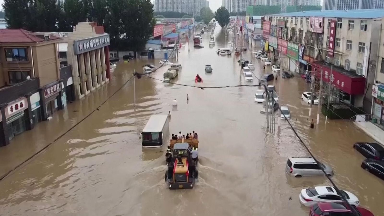 China floods: Drone footage shows extent of flooding in Zengzhou ...