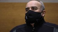 Argentine golfer Angel Cabrera, charged with assaulting three former partners, attends his trial in Cordoba, Argentina, Wednesday, July 7, 2021. Cabrera, who has won both the Masters and the U.S. Open, spent months on the run from the case involving assault claims filed by his former girlfriend Cecilia Torres Mana, his former wife Silva Rivadero and former partner Micaela Escudero. (AP Photo/Nicolas Aguilera)