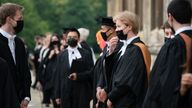 Students from King&#39;s College prepare for the procession to Senate House for their graduation ceremony at the University of Cambridge