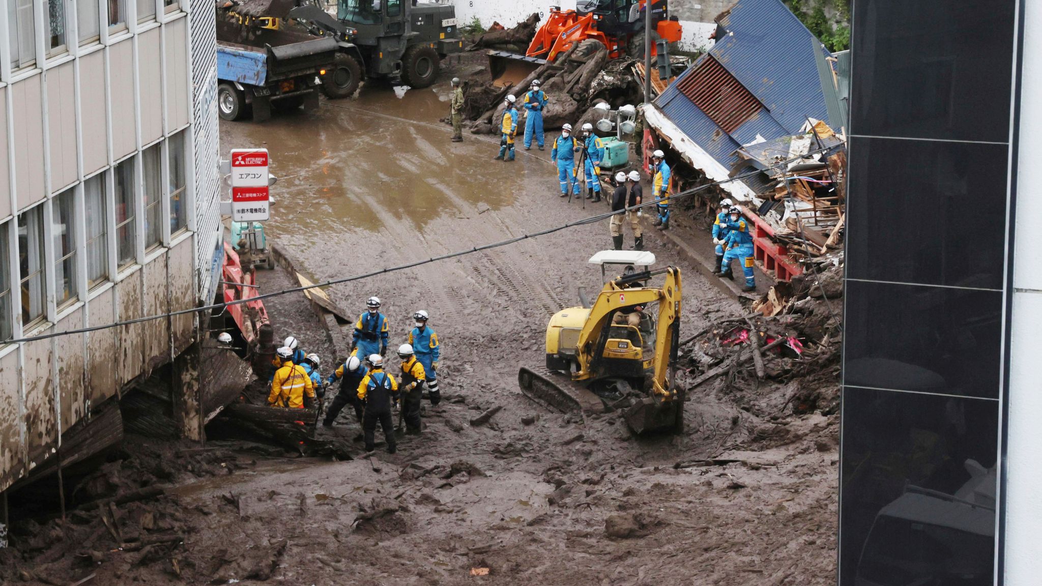 Japan: At least four dead and dozens feared missing after landslide in ...