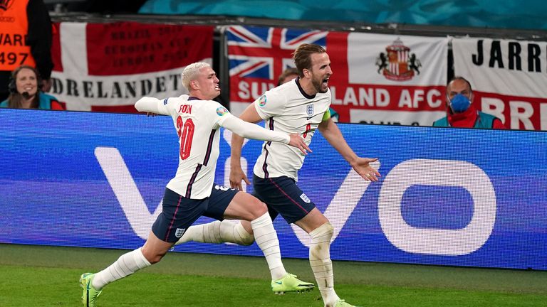 England's Harry Kane celebrates scoring their side's second goal of the game with Phil Foden during the UEFA Euro 2020 semi final match at Wembley Stadium, London. Picture date: Wednesday July 7, 2021.