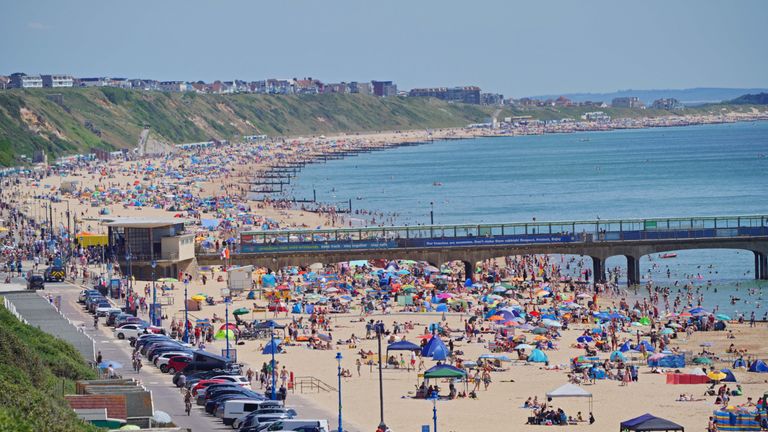 People enjoy the weather on Bournemouth beach in Dorset. England could see the hottest day of the year this weekend as the skies finally clear after weeks of wet and humid weather. Picture date: Saturday July 17, 2021.
