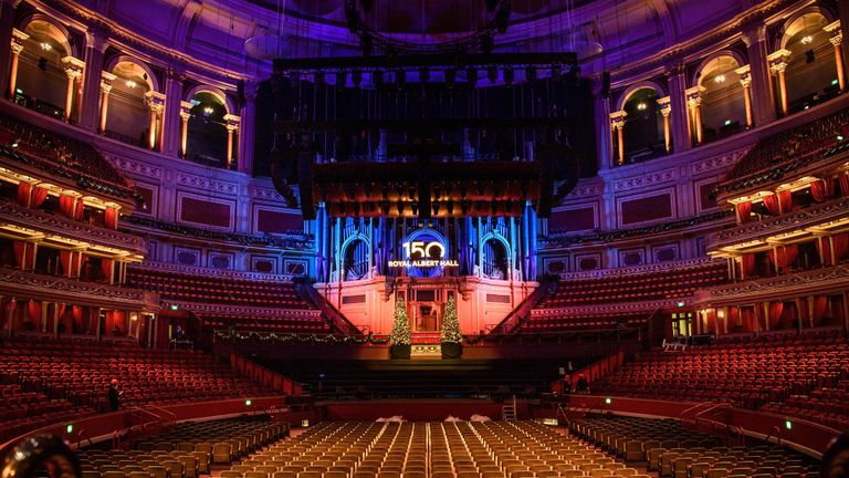 EDITORIAL USE ONLY Staff install and switch on a new sign at the Royal Albert Hall in London, as it prepares to celebrate its 150th anniversary.