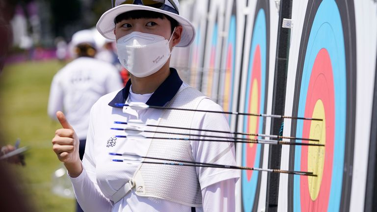 San An (KOR) poses near her target after scoring an Olympic record score of 680 in the archery ranking round during the Tokyo 2020 Olympic Summer Games. Pic: Jack Gruber-USA TODAY Network