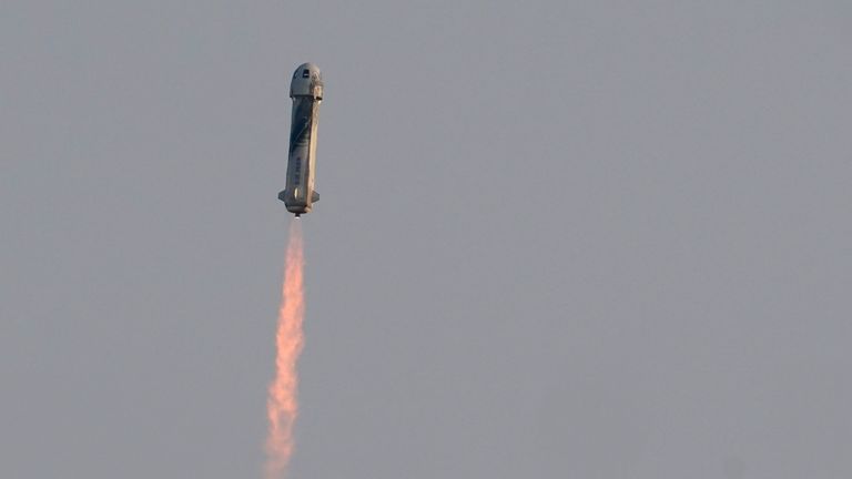 Blue Origin&#39;s New Shepard rocket launches carrying passengers Jeff Bezos, founder of Amazon and space tourism company Blue Origin, brother Mark Bezos, Oliver Daemen and Wally Funk, from its spaceport near Van Horn, Texas, Tuesday, July 20, 2021. (AP Photo/Tony Gutierrez)