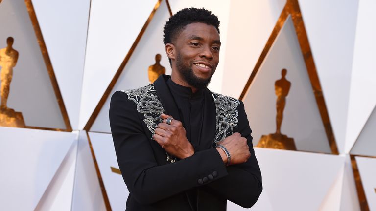 FILE - In this March 4, 2018, file photo Chadwick Boseman arrives at the Oscars at the Dolby Theatre in Los Angeles. The acclaimed actor is being posthumously honored as the namesake of Howard’s newly re-established Chadwick A. Boseman College of Fine Arts. Boseman, who graduated in 2000 with a BFA in directing, died in August 2020 at age 43 of colon cancer, after an illness that was largely kept secret. He rose to prominence playing a succession of Black icons in biographical films: Jackie Robi