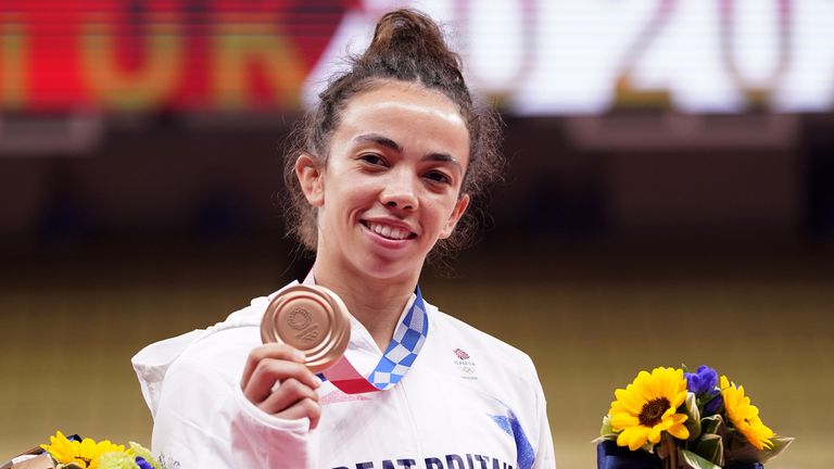 Giles, 24, with her bronze medal