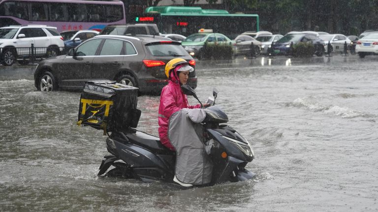 Heavy rainfall causes waterlogging in Zhengzhou city, central China&#39;s Henan province, 20 July 2021. (Imaginechina via AP Images)      