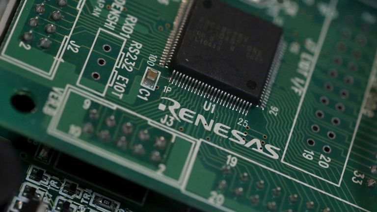 A Renesas Electronics Corp&#39;s chip is pictured at the company&#39;s office in Tokyo, March 21, 2013