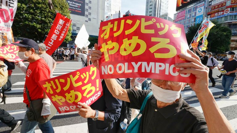 It hasn&#39;t been all celebration in Japan ahead of the official start of the Olympic games, with people protesting in Tokyo&#39;s Shibuya district, calling for the games to be cancelled. Pic AP