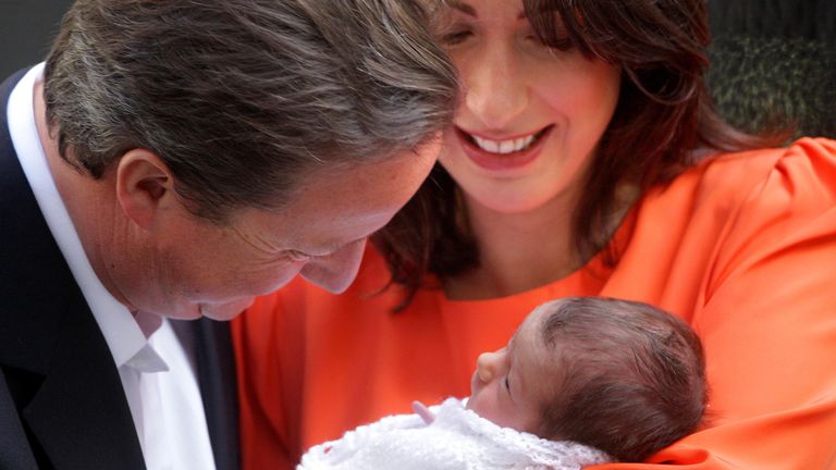 Prime Minister David Cameron and his wife Samantha hold their baby daughter Florence Rose Endellion Cameron outside 10 Downing Street, central London, following their return to London after their summer holiday in Cornwall.
