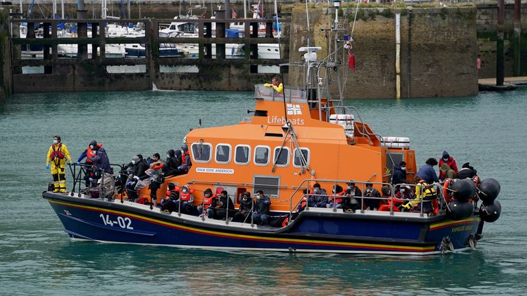 A group of people thought to be migrants are brought in to Dover, Kent, onboard a lifeboat following a small boat incident in the Channel earlier on Sunday. Picture date: Sunday July 4, 2021.